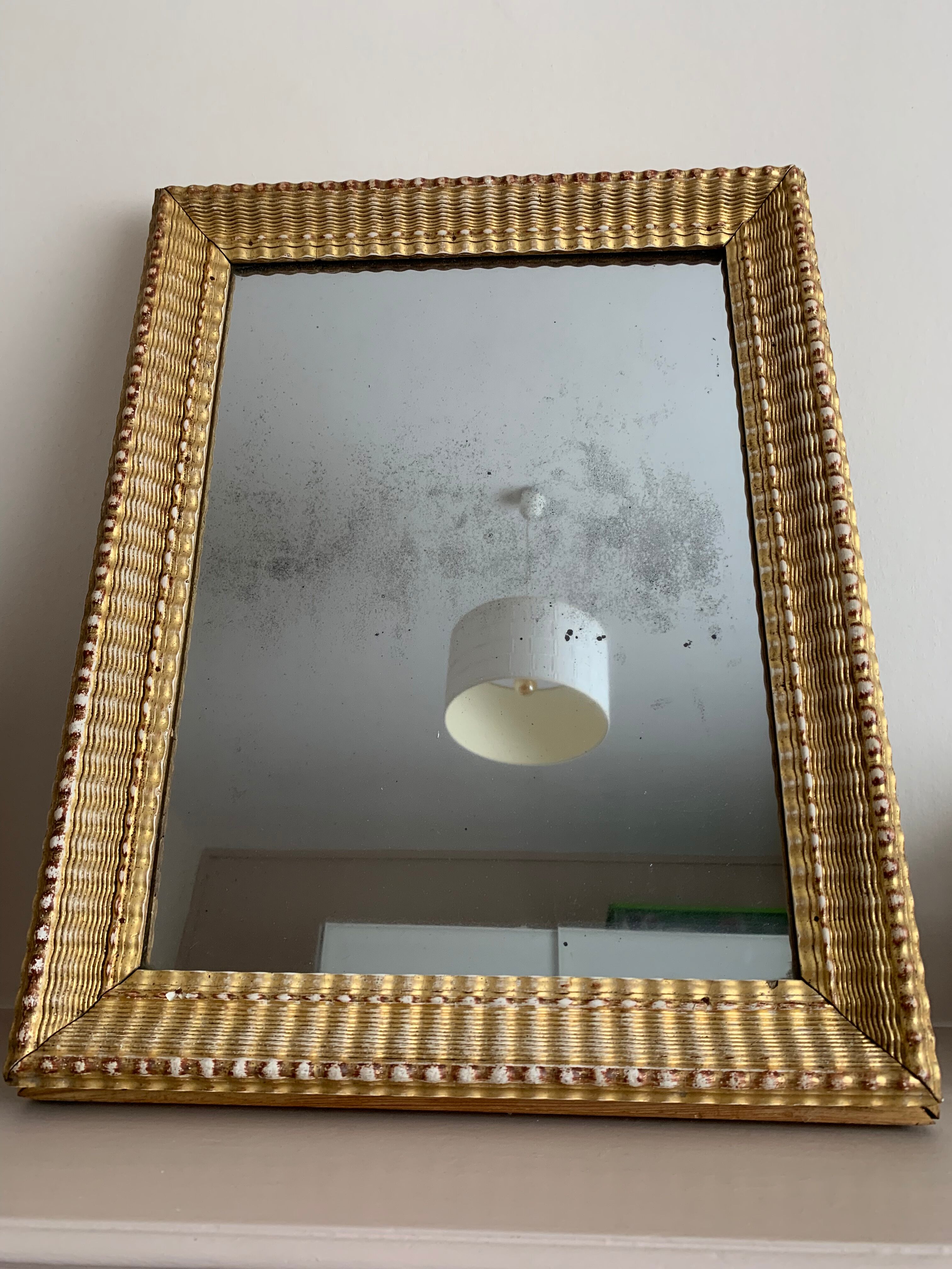 Carved and gilded wooden mirror  44x56cm