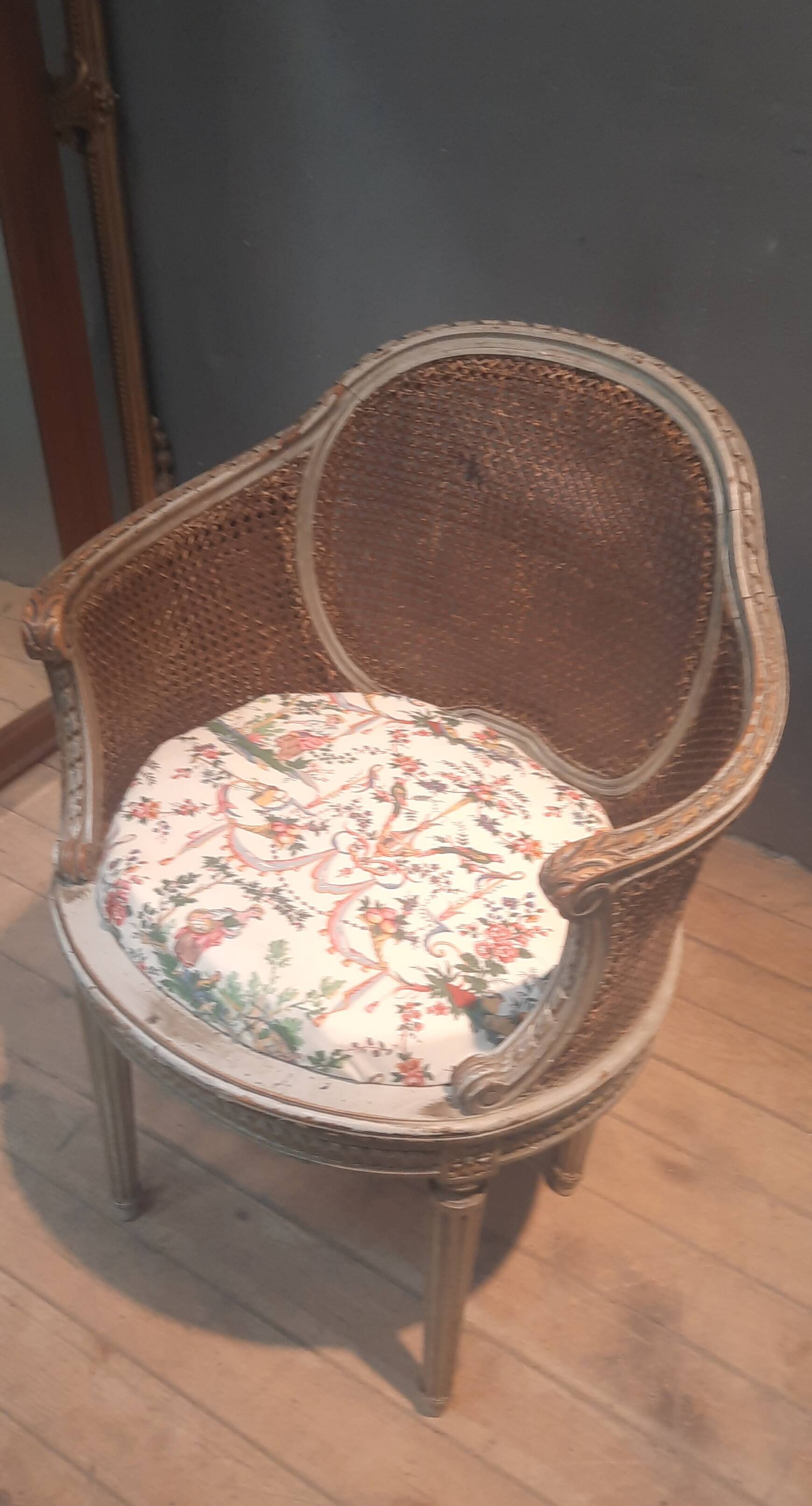 Caned armchair in Louis XVI style