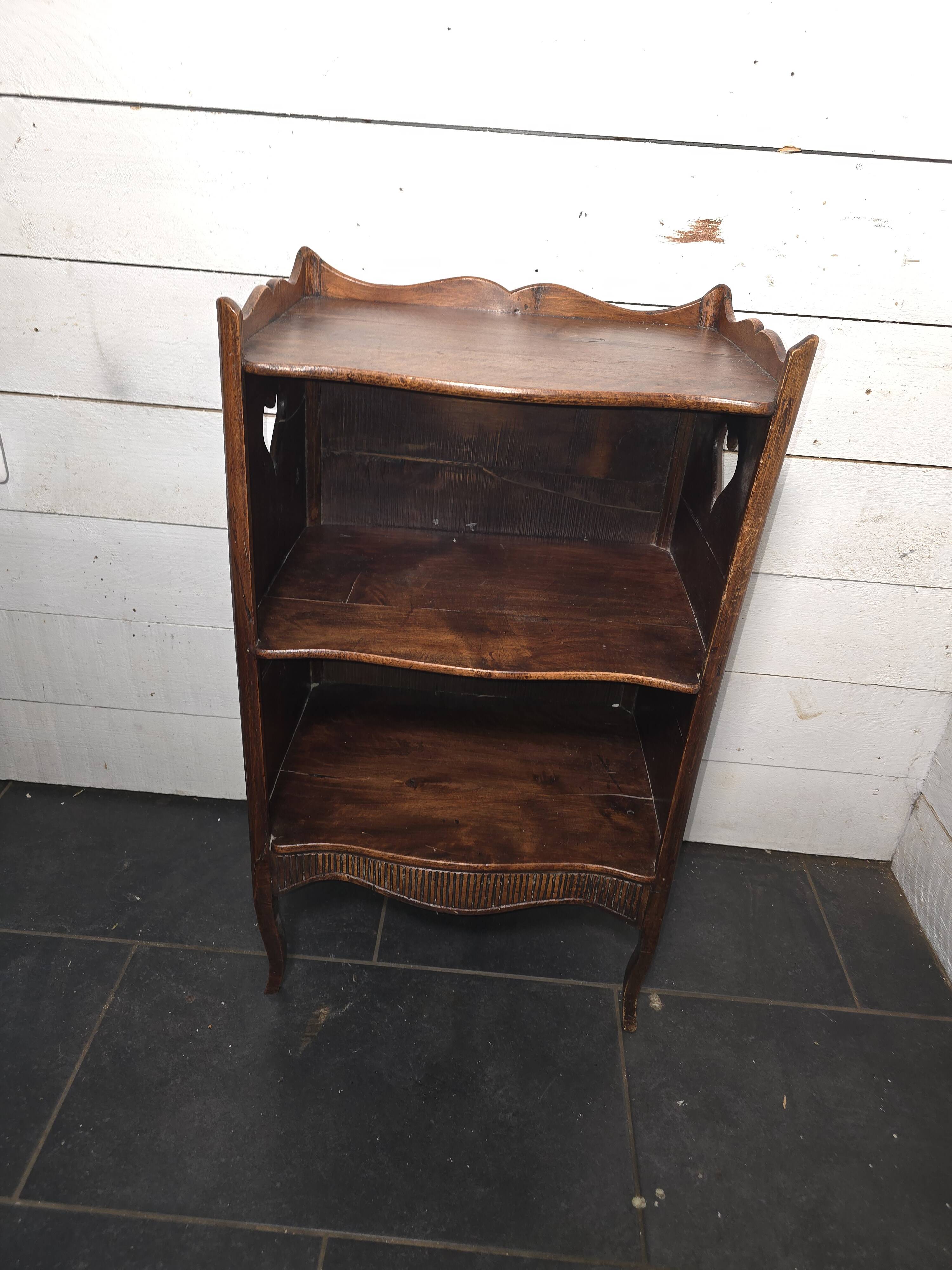 Open library in Louis XV style made of walnut.