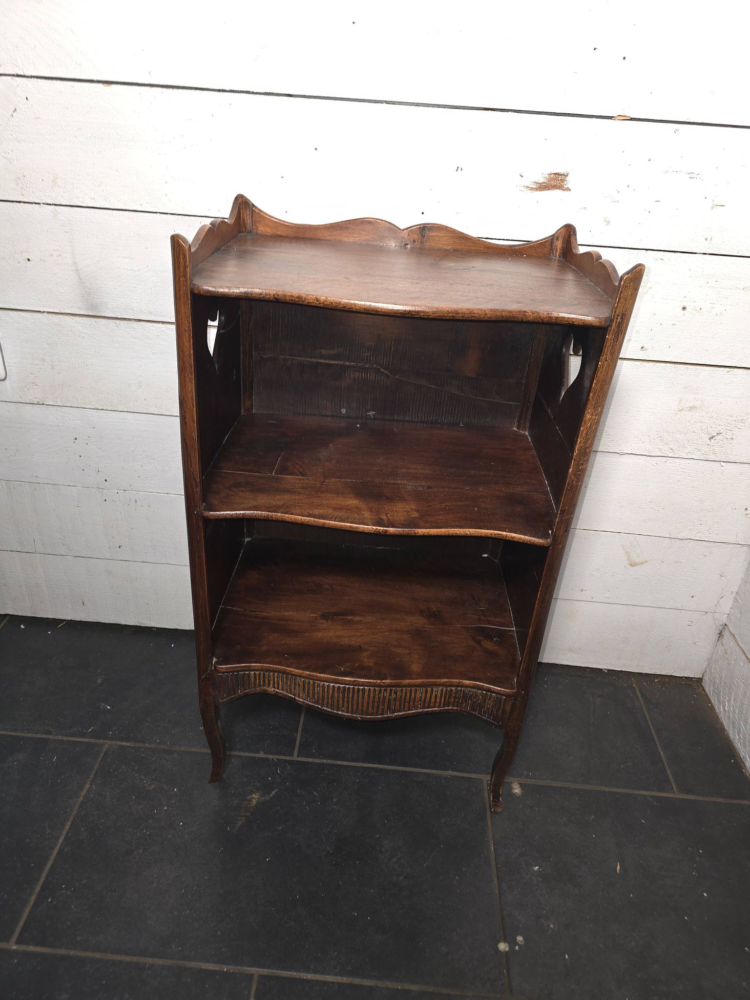 Open library in Louis XV style made of walnut.