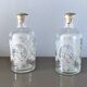Pair of antique wheel-engraved glass bottles - good condition