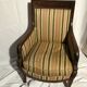 Fauteuil bergère aux dauphins époque Restauration