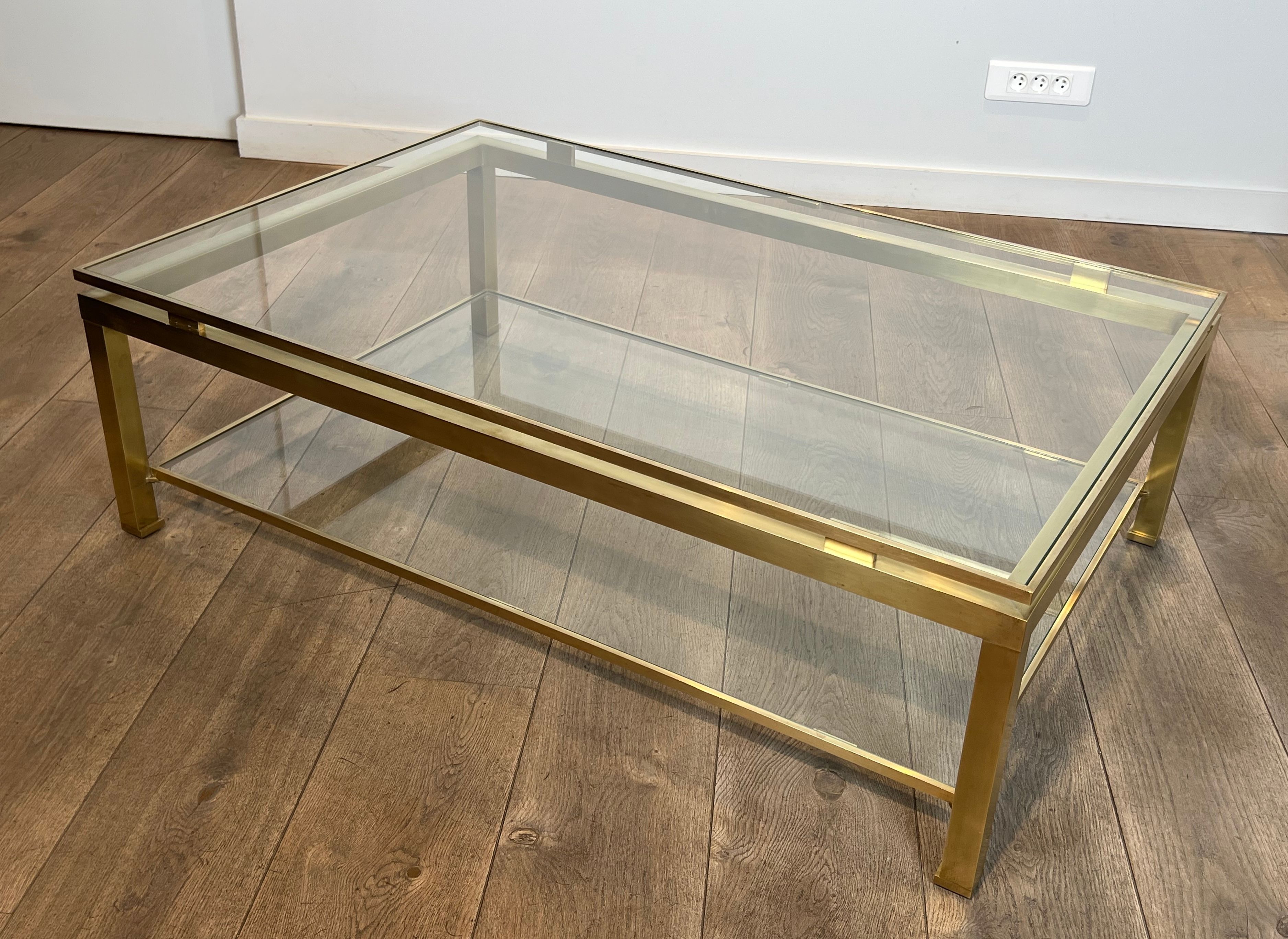 Modernist coffee table in brass and glass tops by Guy Lefèvre for Maison Jansen.