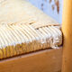 Quatre tabourets en bois et en paille 70s
