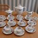 Coffee and tea service in Limoges porcelain with anemone flower pattern and gilding.
