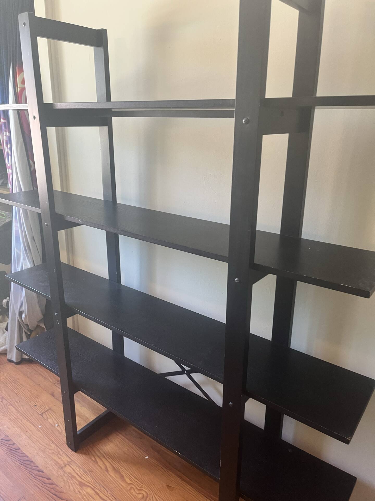 Large vintage bookshelf in solid black wood, Scandinavian style.