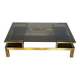 Modernist coffee table in brass and smoked glass tops by Guy Lefèvre for Maison Jansen.