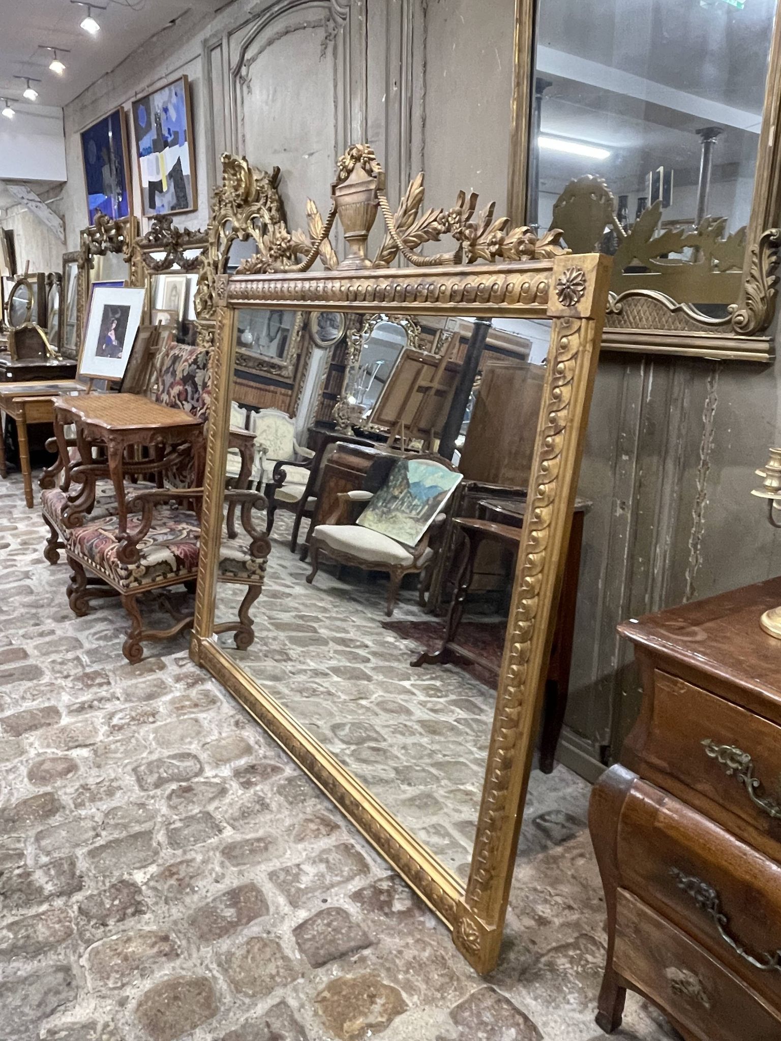 Large gold mirror with mouldings