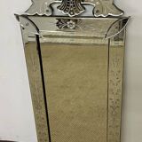 Venetian mirror with floral decoration pediment