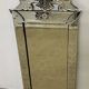 Venetian mirror with floral decoration pediment