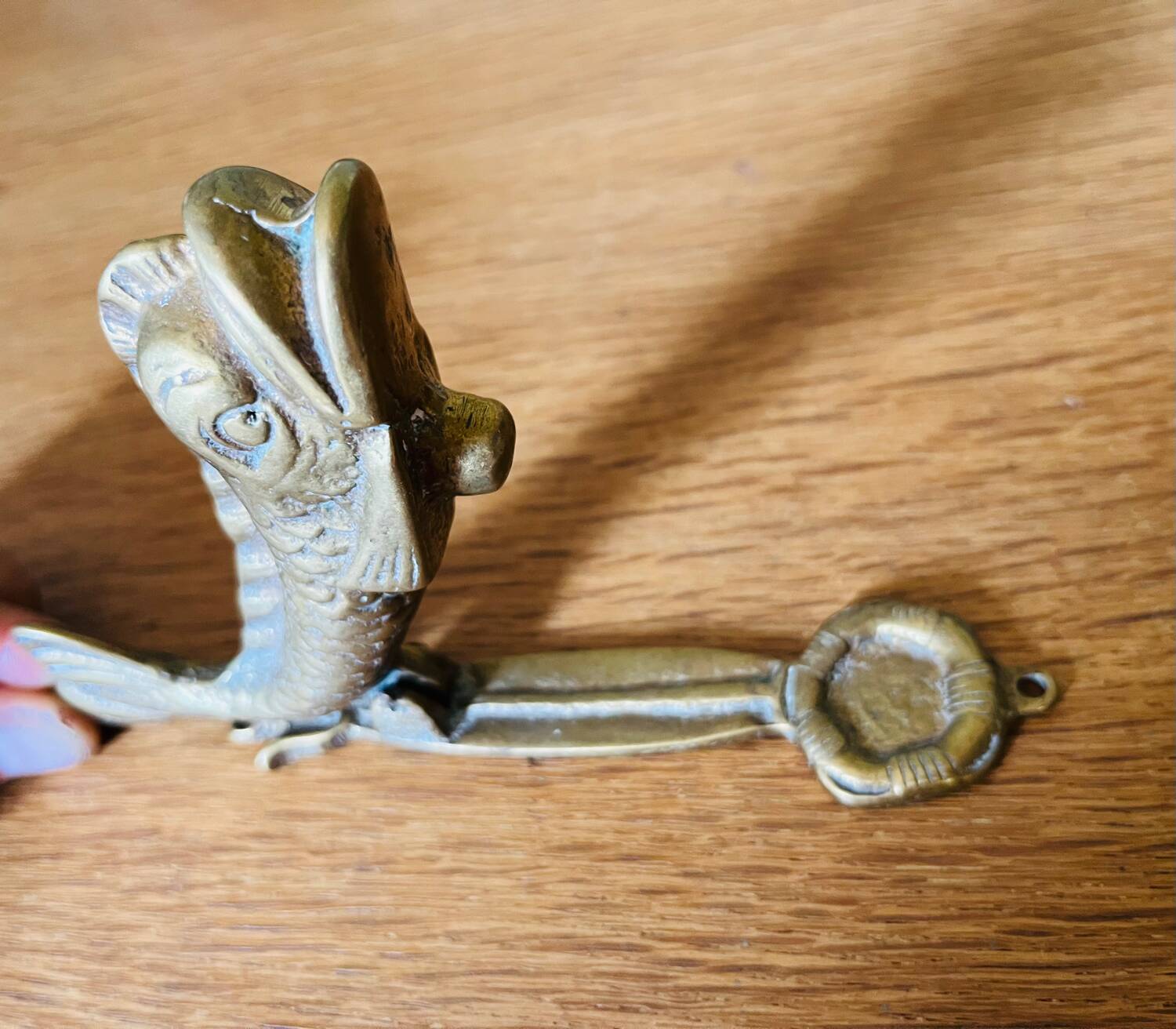 Bronze fish knocker