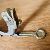 Bronze fish knocker