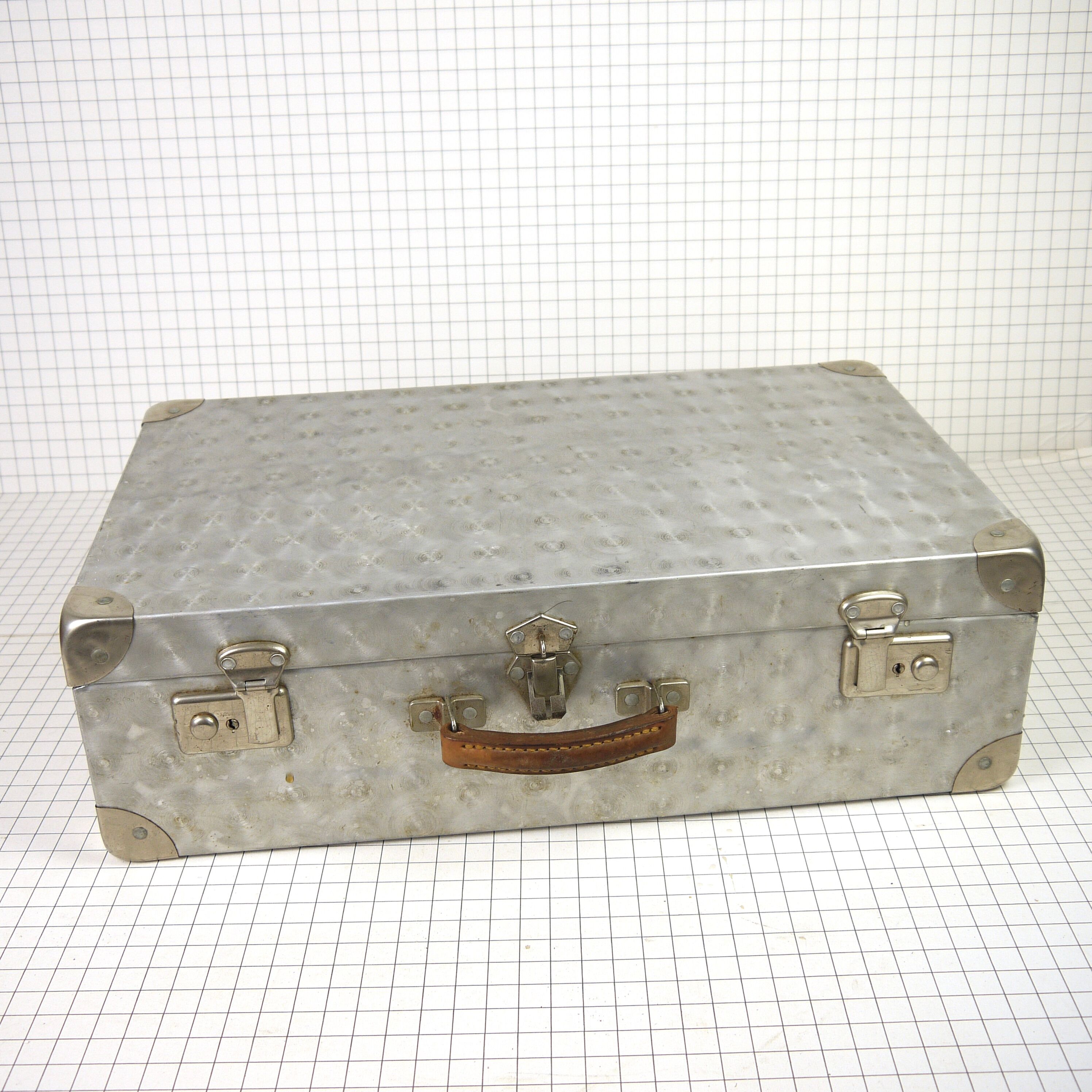 Metal case and leather handle