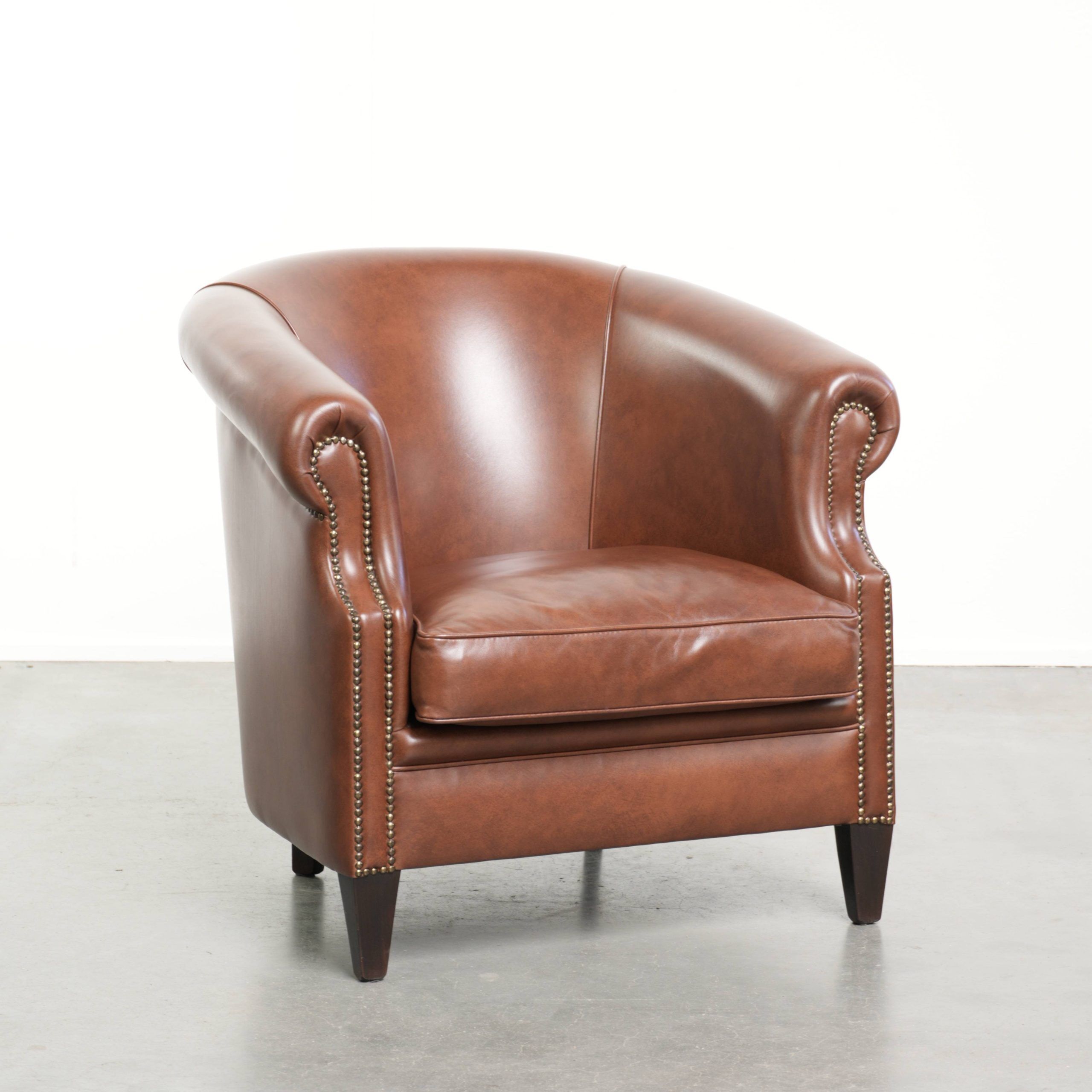 Cognac-coloured comfortable cow leather club armchair in English style