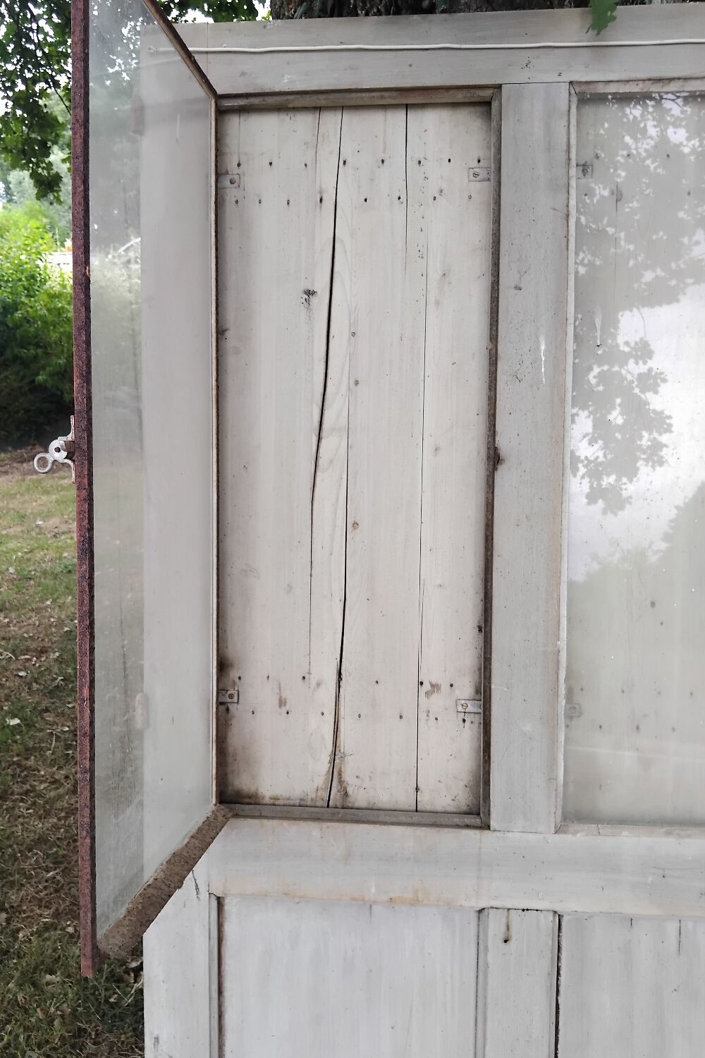 Old door with vintage wooden shutters