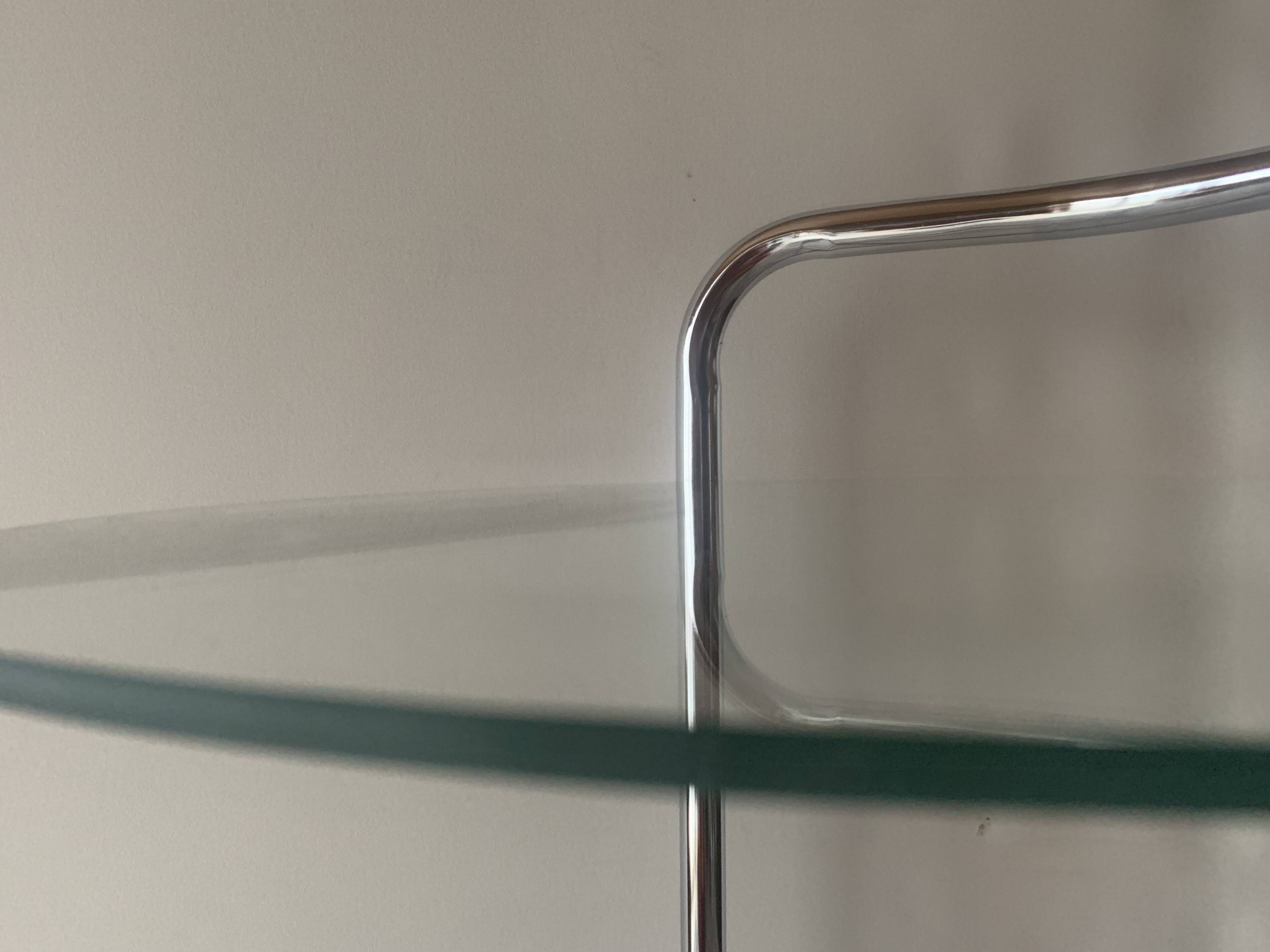 Pedestal table, vintage chrome steel saddle with 2 round windows