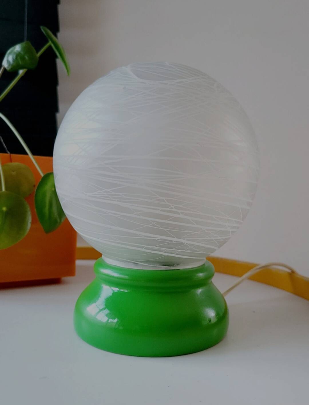 Vintage French table lamp with glass opaline shade and wooden green lamp base.