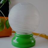 Vintage French table lamp with glass opaline shade and wooden green lamp base.