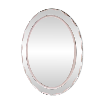 1970s Italian oval mirror by Crystal Arte with faceted glass frame