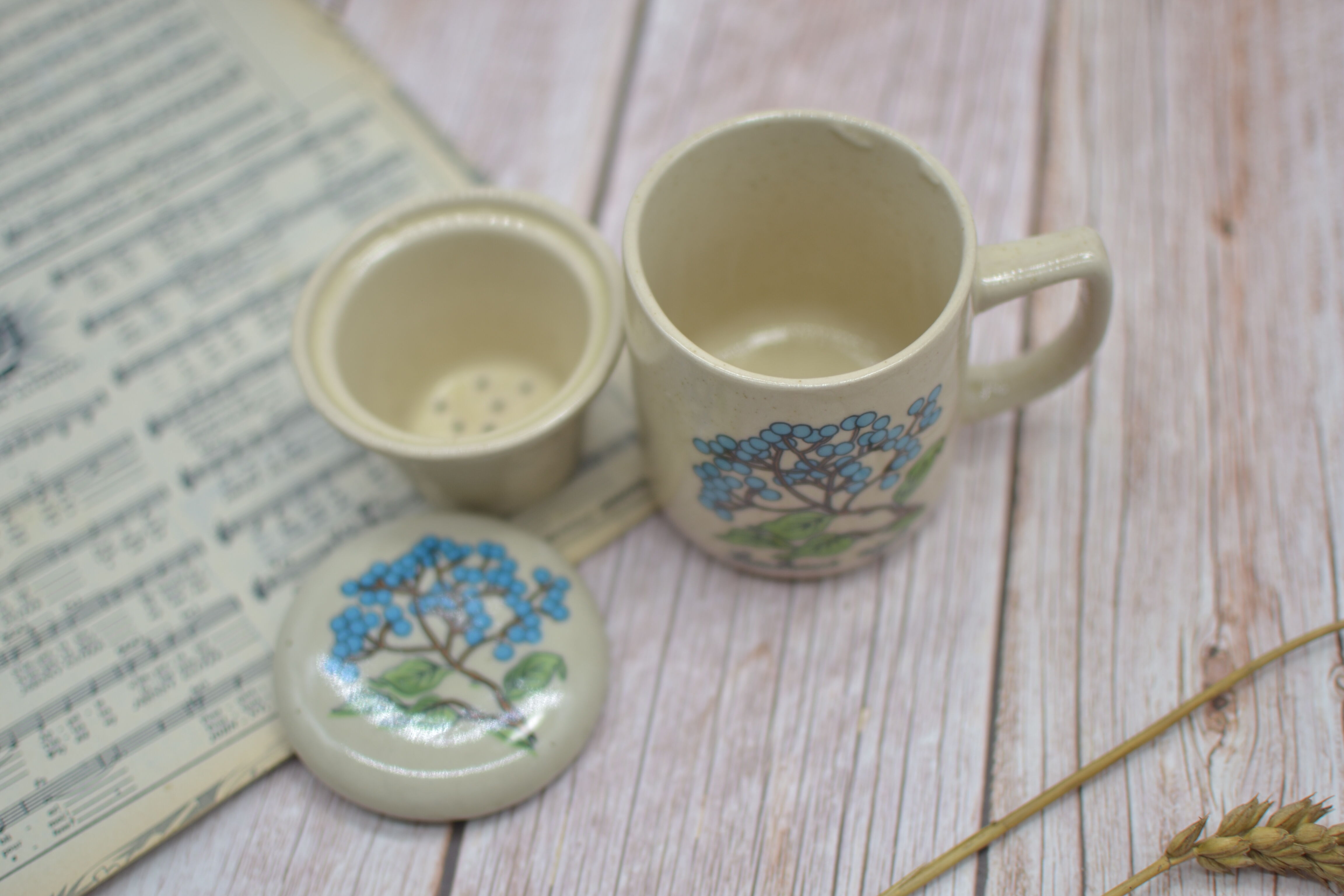 Vintage sandstone teapot with infuser
