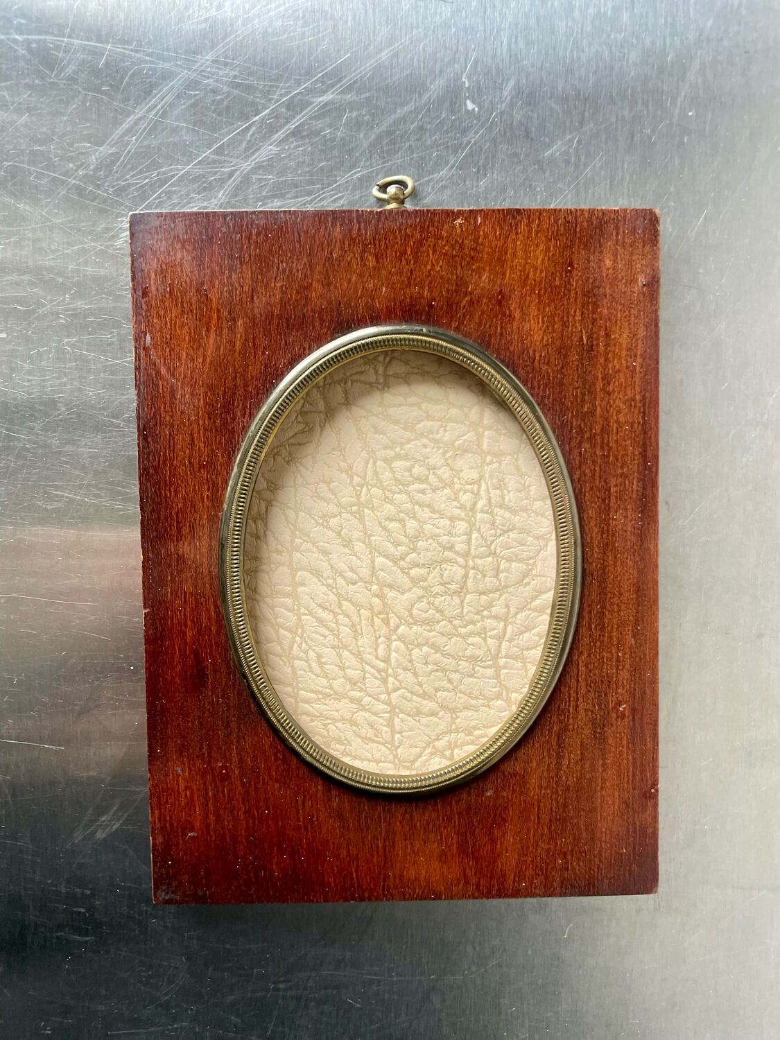 Mahogany wood frame with brass borders