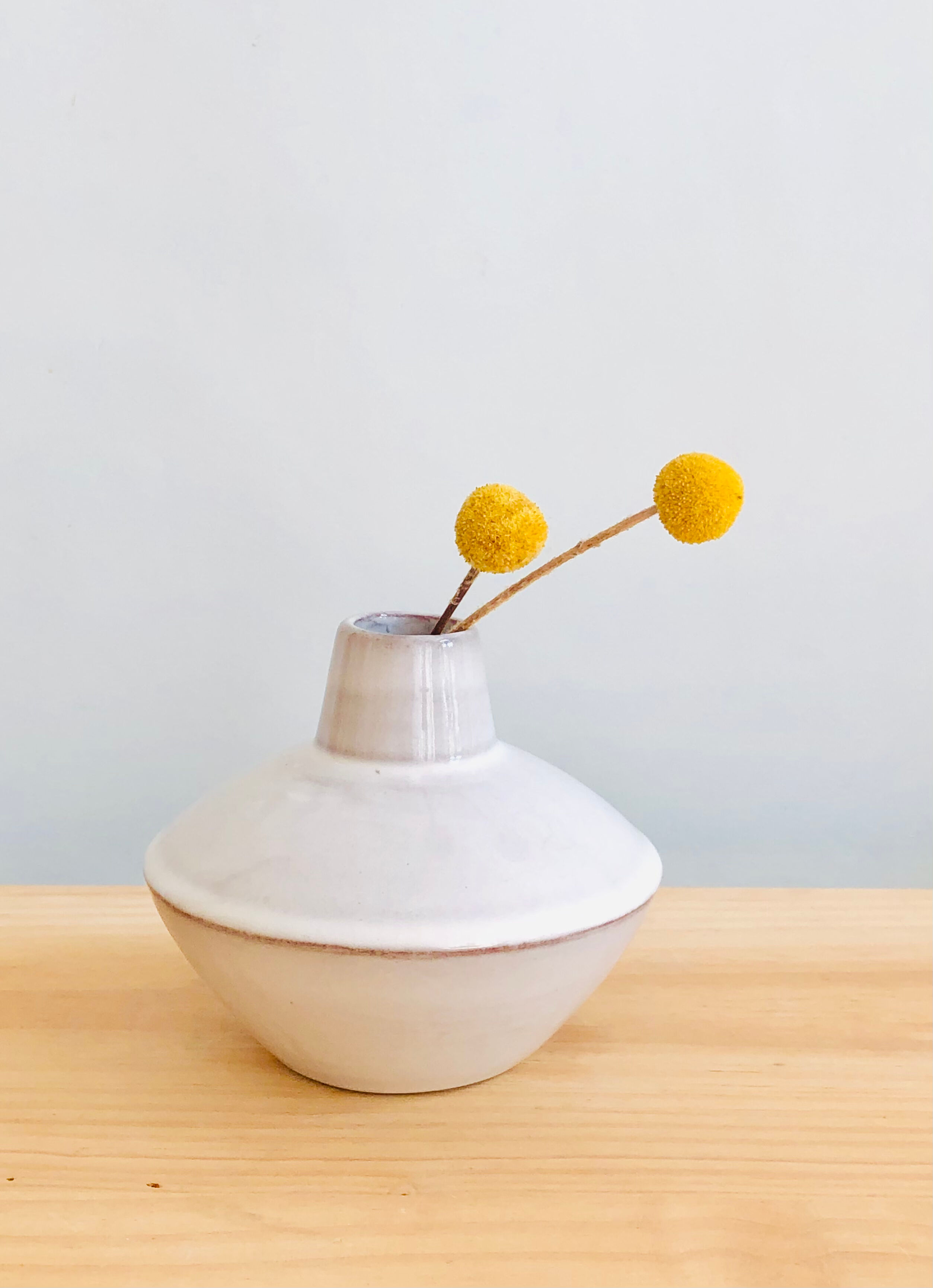 White enamelled terracotta vase