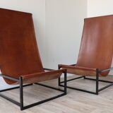 Pair of vintage armchairs in stretched leather and metal structure