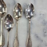 Set of 12 spoons of the middle twentieth in silver metal