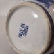 Old Chinese blue and white teapot in vintage ceramic with dragon decor