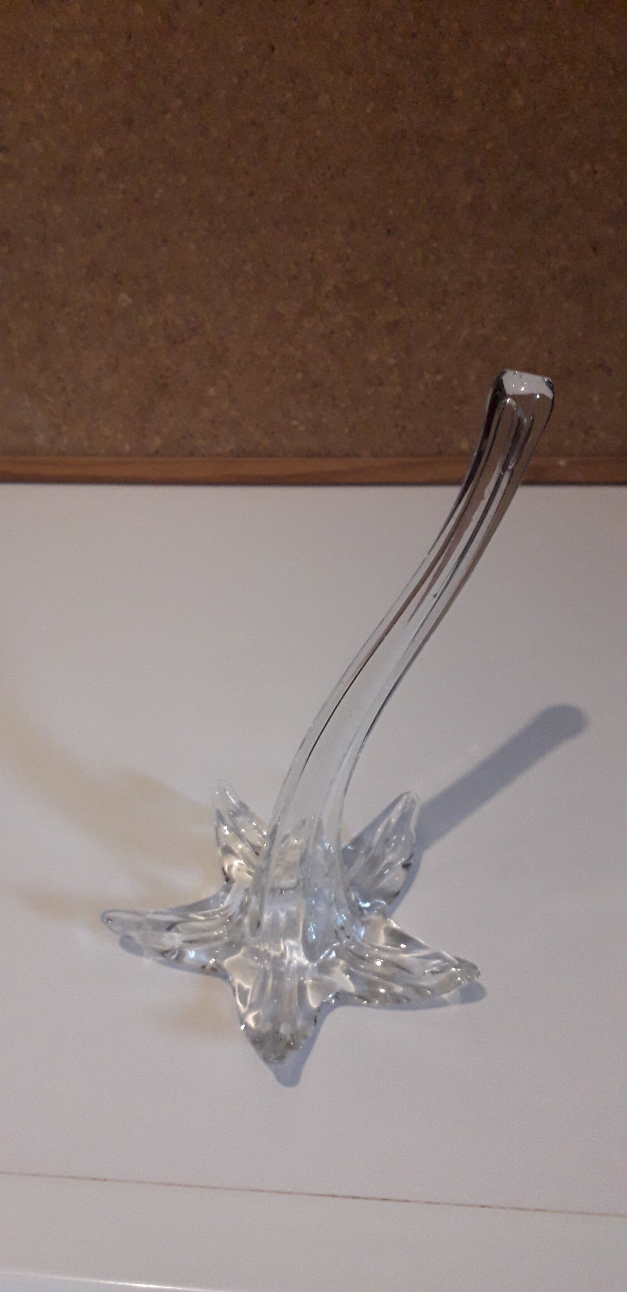 Glass soliflore vase in the shape of a fleur-de-lis on metal base