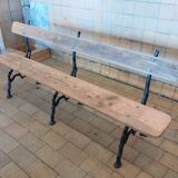 Antique garden bench with cast iron legs
