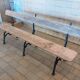 Antique garden bench with cast iron legs