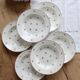 6 vintage white earthenware deep plates with red patterns