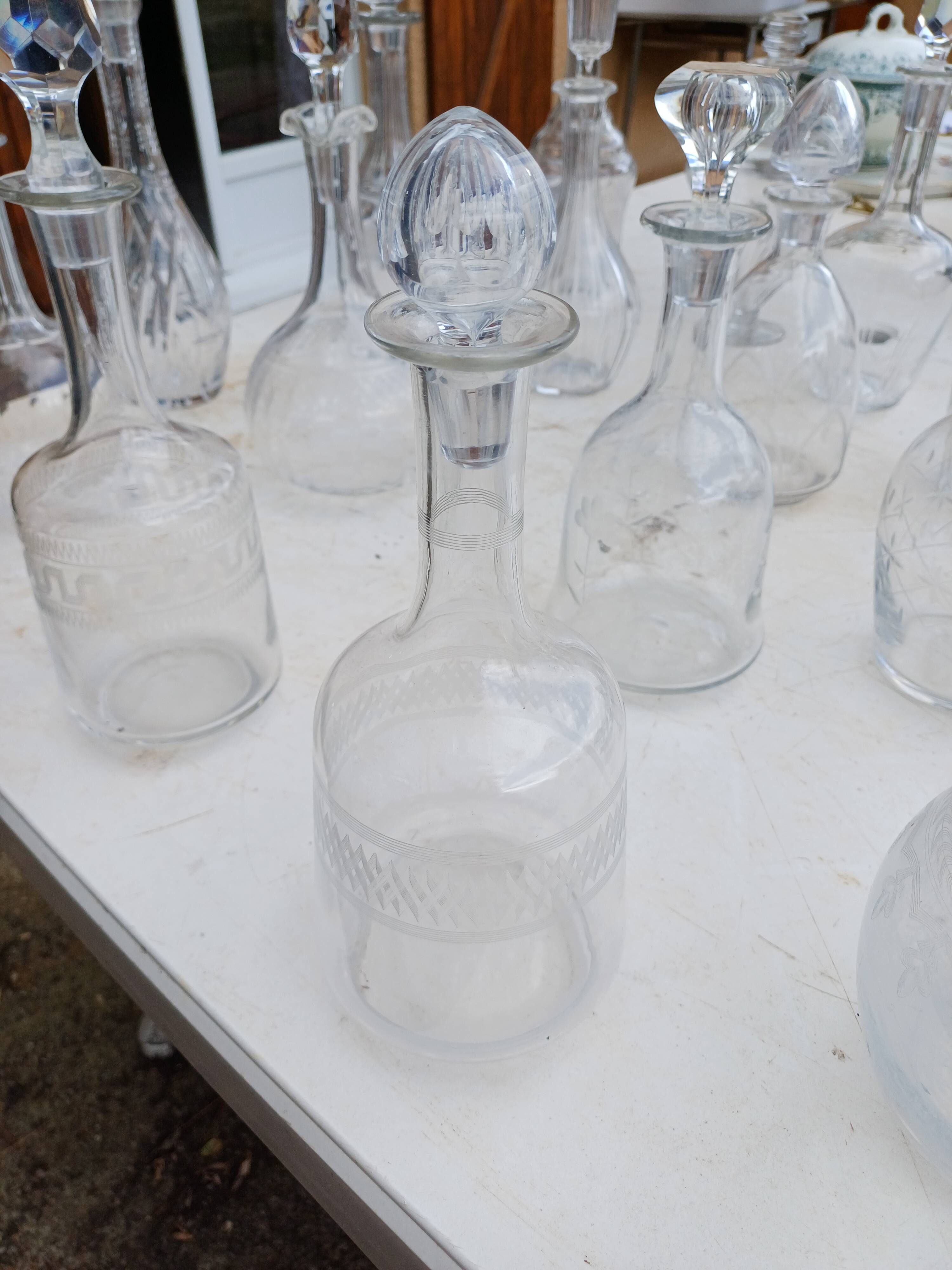 Set of 18 glass and crystal carafes