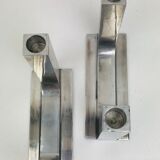 Pair of aluminum design candlesticks