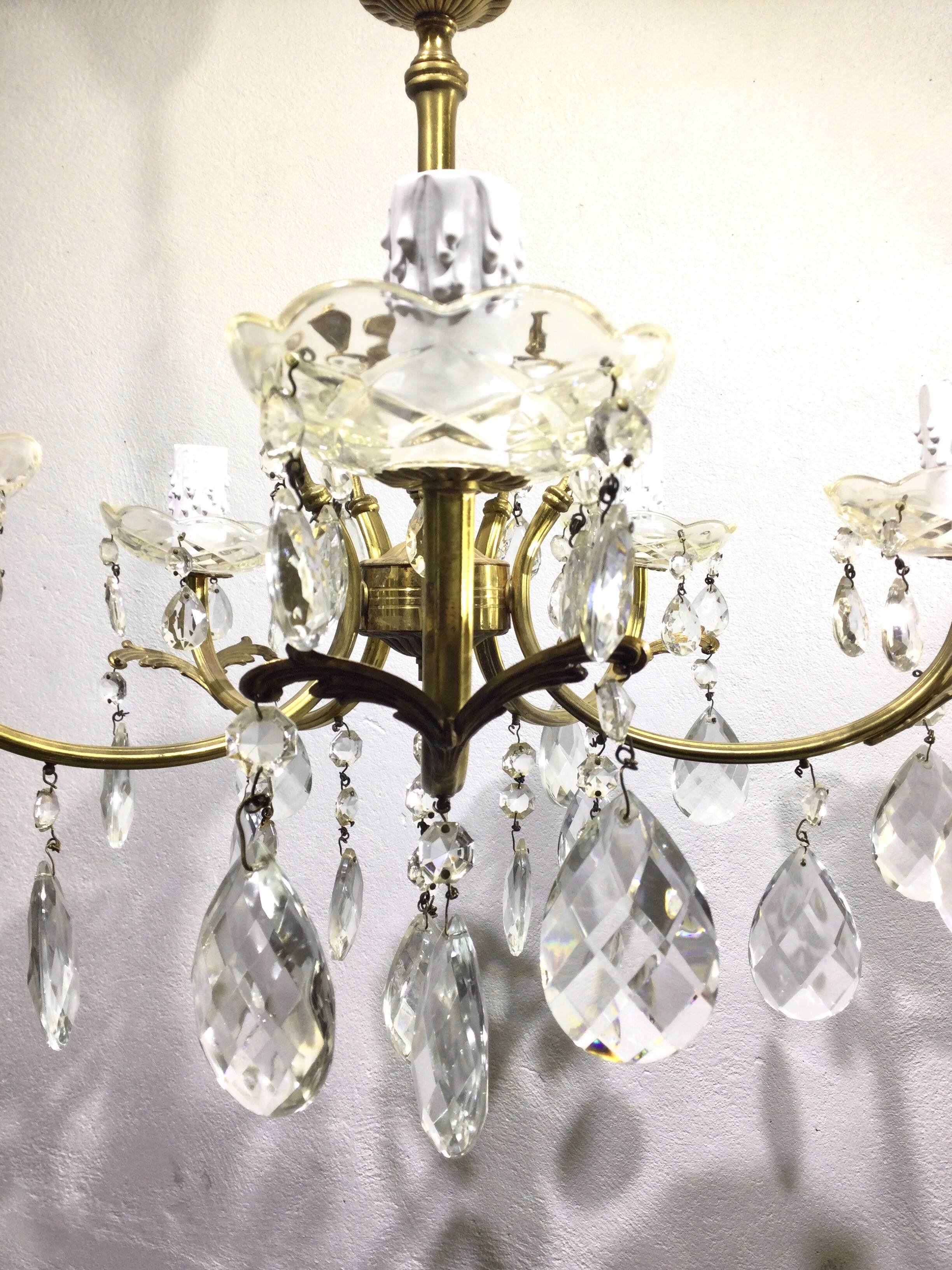 5-light chandelier in brass and tassels