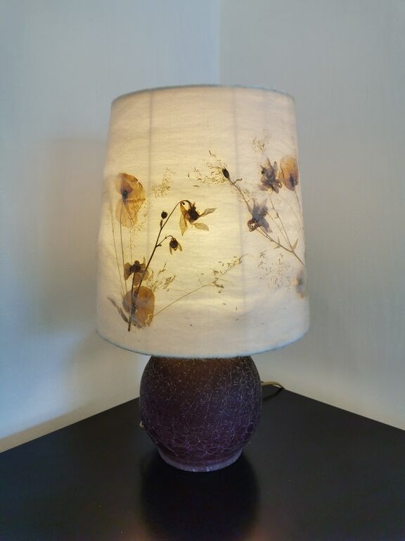 Glass lamp and day lamps in dried flowers