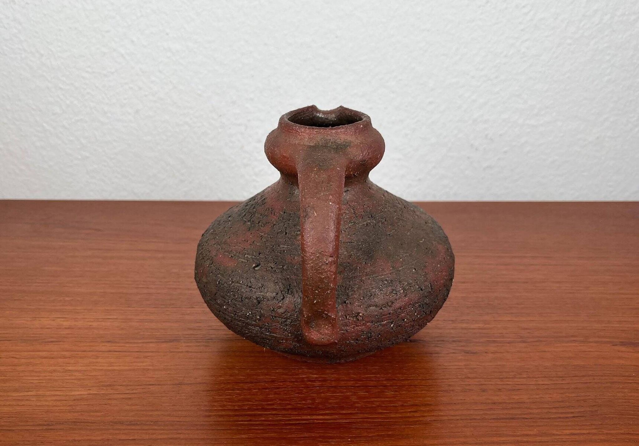 Carafe vase by German studio pottery, brutalist vintage by Gerhard Liebenthron, 1974.