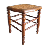 Tabouret ancien en bois et assise en cannage