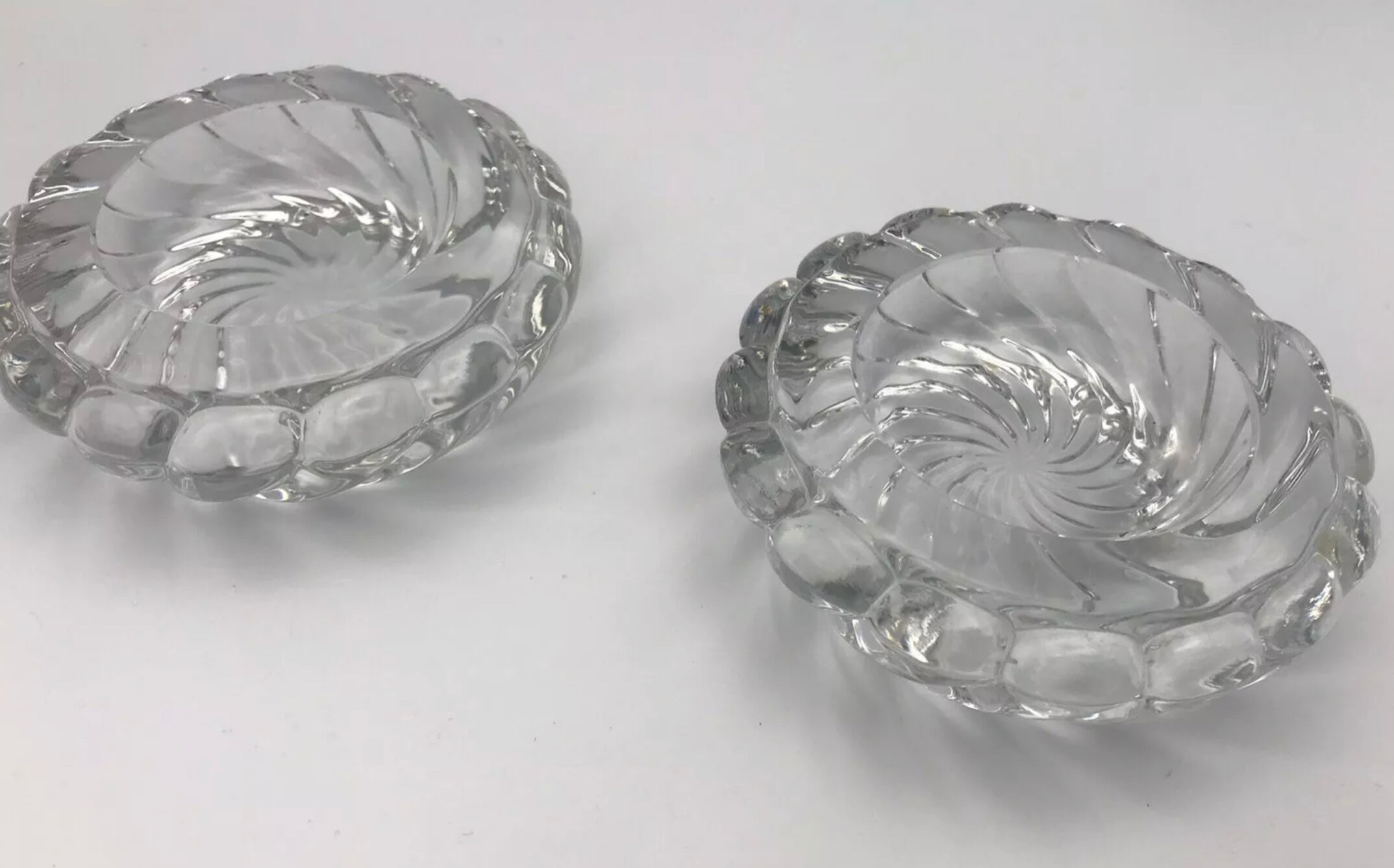 Pair of twisted round candlesticks in baccarat crystal stamped