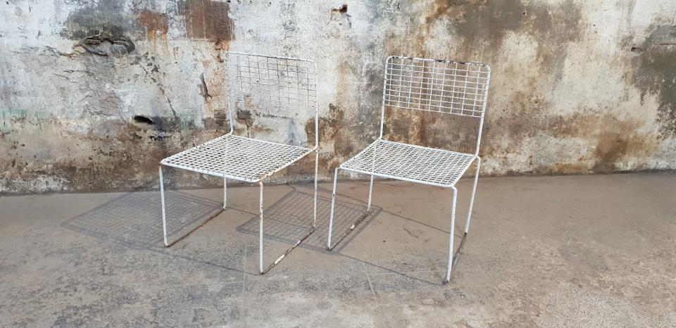 Two vintage metal chairs