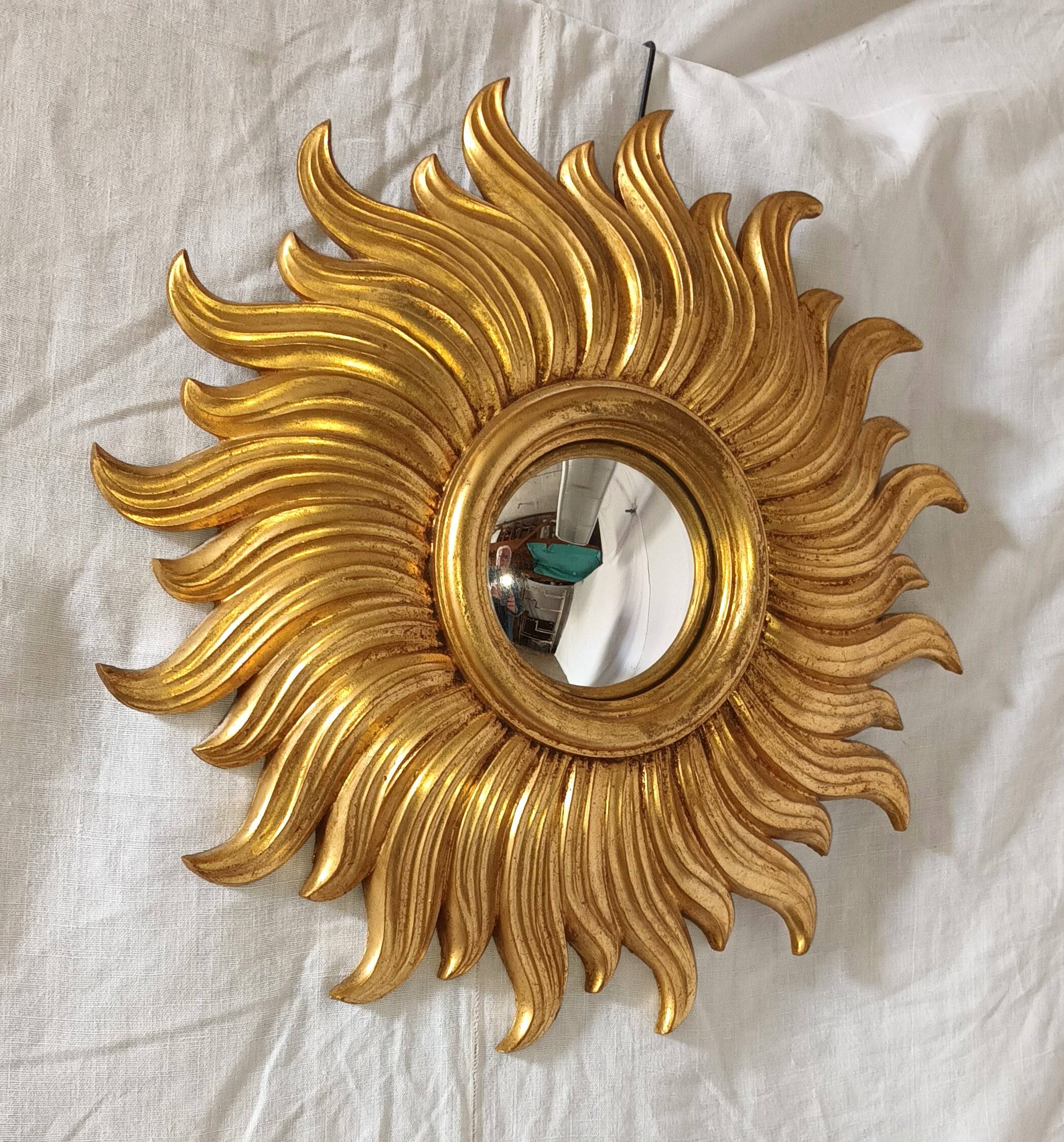 Miroir soleil en bois doré des années 90