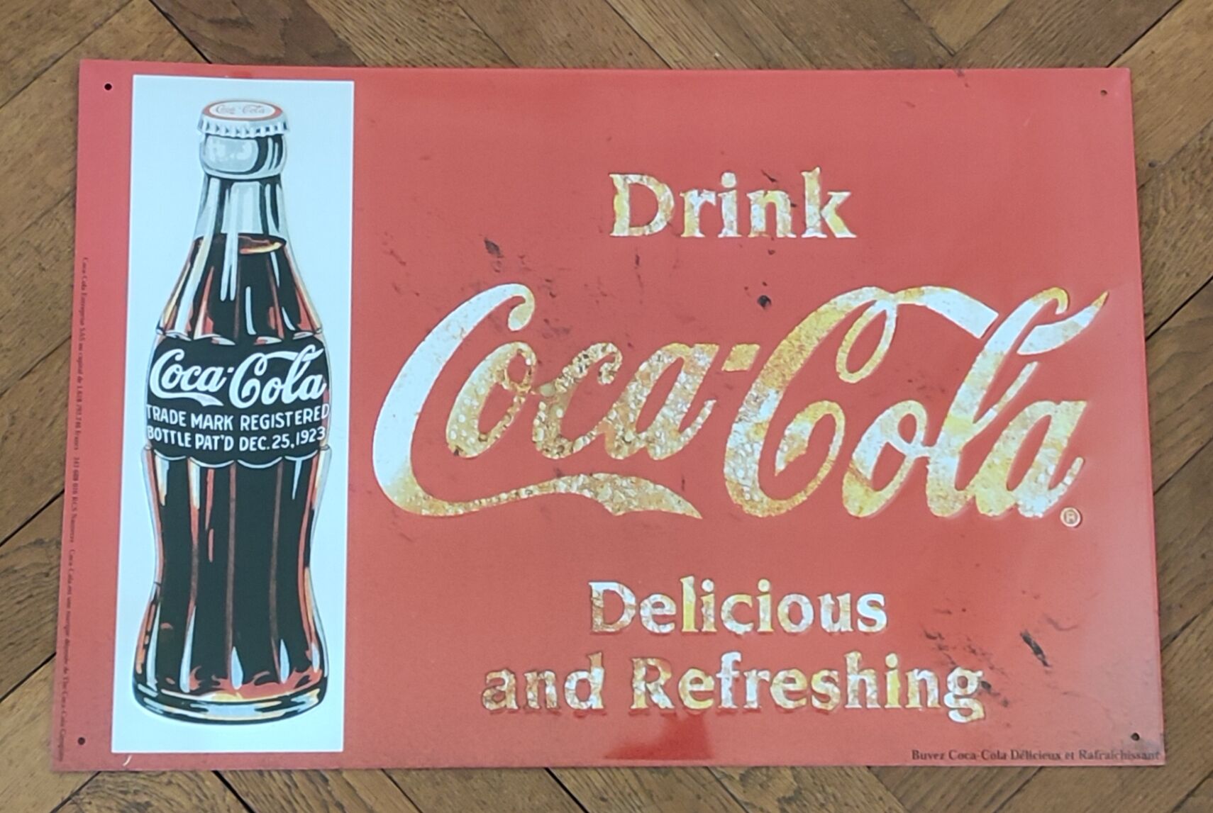 Vintage Coca Cola advertising plaque