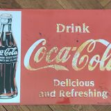 Vintage Coca Cola advertising plaque