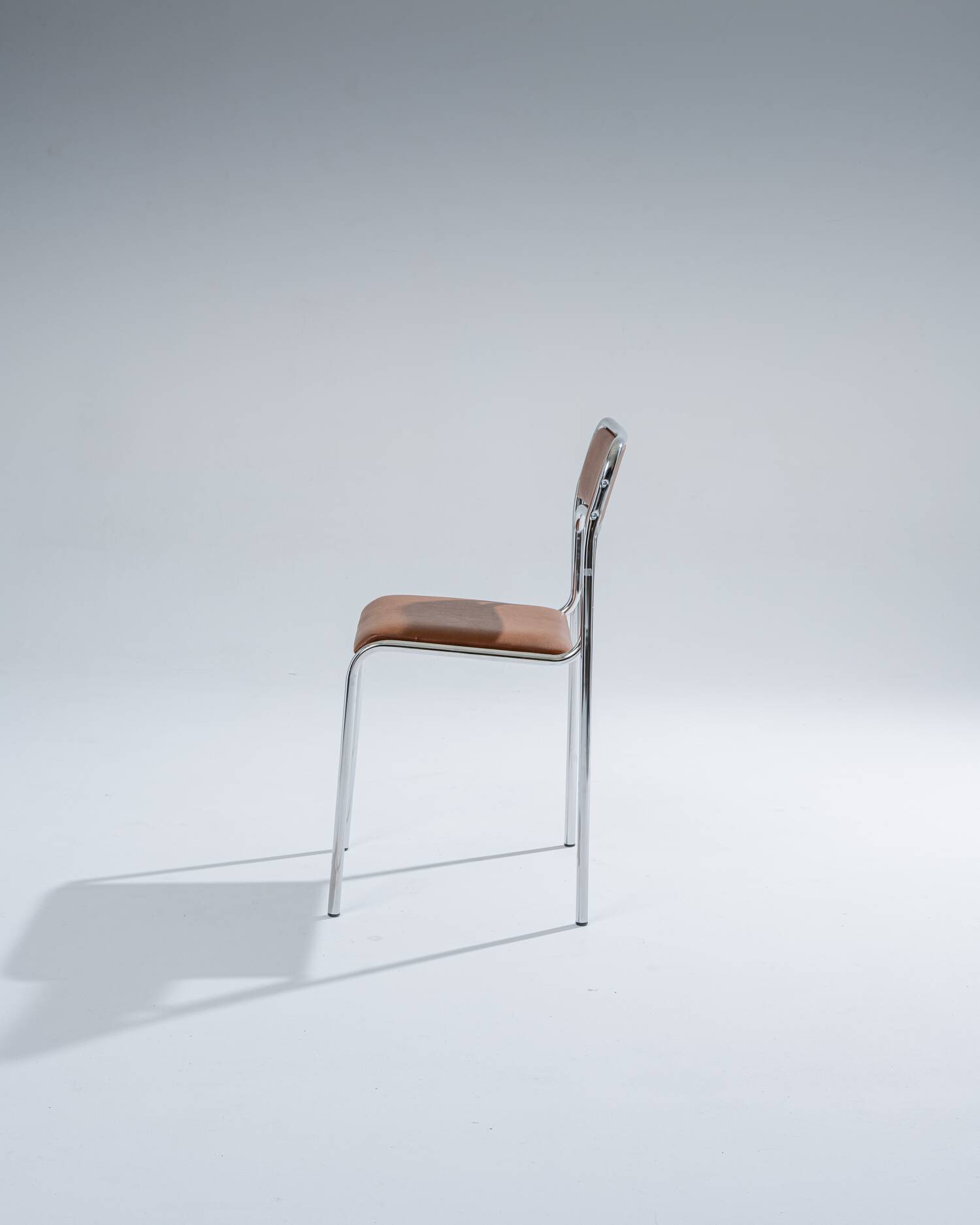 Tubular steel and cognac leatherette chair, 1980s