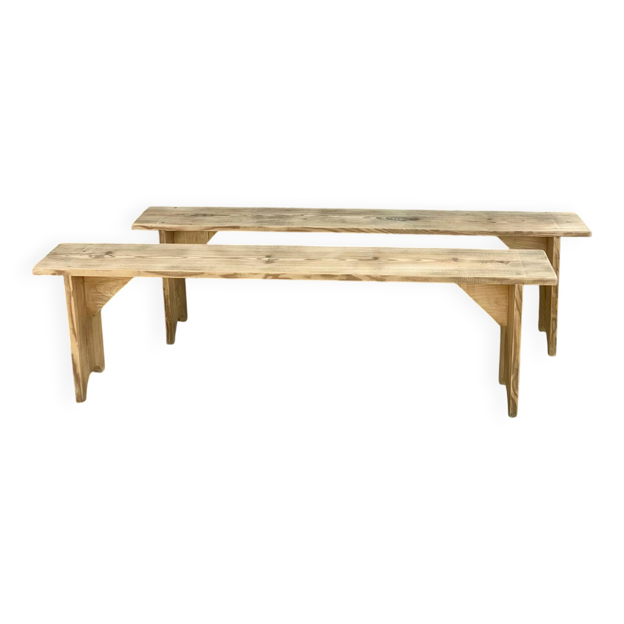 Pair of old farmhouse benches made of raw solid wood.