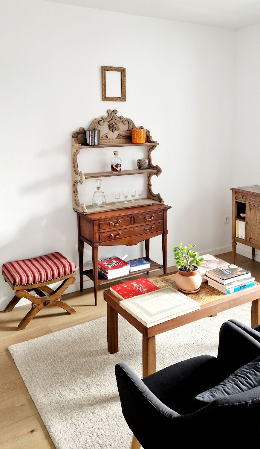 Old wall shelf carved in walnut