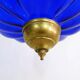 Suspension chandelier, oriental blue glass lantern and brass structure. Year 70-80