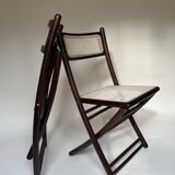 Set de quatre chaises pliantes en bois et cannage