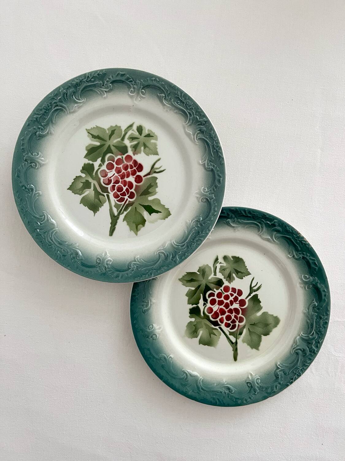 2 antique Pexonne earthenware dessert plates with grapes